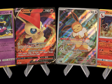 four pokemon cards are lined up in a row on a black background