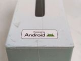 a box with a sticker on it sitting on a table