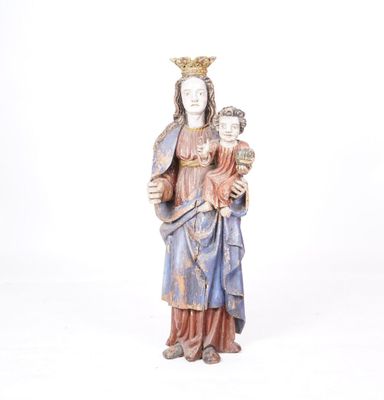 statue of a woman holding a child with a crown on her head