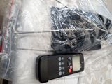a remote control sitting on top of a plastic bag