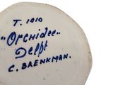 a blue and white vase with writing on it