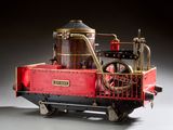 une maquette de machine à vapeur exposée sur une table