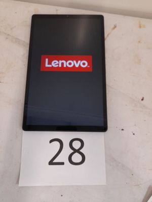 a lenovo phone sitting on a table with a price tag