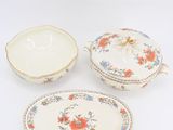 a set of three porcelain dishes and a bowl