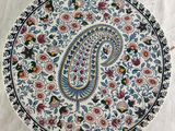 an image of a decorative plate with a paisley design on it