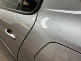 a car that has a hole in the side of it