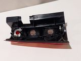 a close up of a small toy train on a white surface