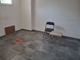 a chair and a table in the corner of a room