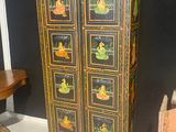 a cabinet that has a lot of drawers inside of it