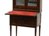 an image of a small desk with a red top