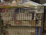 a cart with a lot of items in it in a warehouse