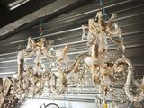 a chandelier hanging from the ceiling in a room