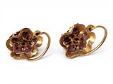 pair of gold and ruby earrings