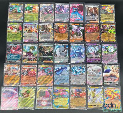 une grande collection de cartes Pokémon posée sur une table