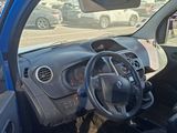 a blue car with a steering wheel and dashboard