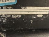 a black box with a blue tag on it