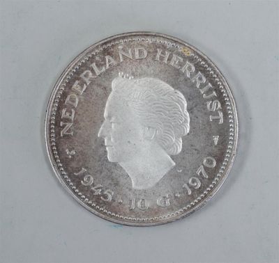 a close up of a coin on a white surface