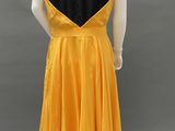 the back of a yellow and black dress on a mannequin mannequin mannequin mannequin mannequin mannequin mannequin mann