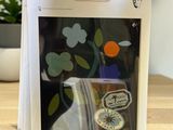 a picture of a picture of a vase with flowers in it