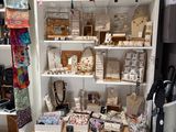 a white cabinet with a lot of items on it