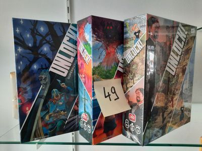 a lot of comics on display in a glass case
