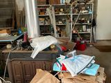 a room with a lot of clutter on the floor
