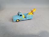 a toy truck with a crane on the back of it