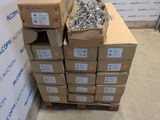 a stack of cardboard boxes with a bunch of screws in them