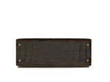 a brown crocodile skin wallet with gold hardware on the front