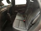 the back seats of a car with a seat belt in the back of it