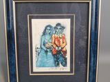 an image of a framed picture of a man and a woman