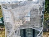 many rolls of wire wrapped in plastic on a pallet