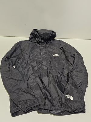 Veste coupe-vent The North Face noire à capuche