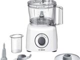a food processor with a blender and a measuring cup