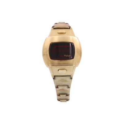 an image of a gold watch with a red face