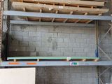 a room that has some shelves in it