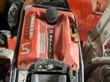 an image of a lawn mower in a garage