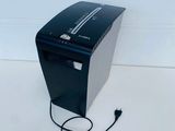 a black desktop computer sitting on a white surface