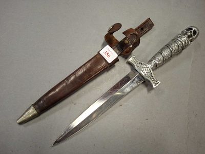 COUTEAU ALLEMAND, poignée en aluminium fondu, à décor de feu…