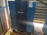 a blue machine that is sitting in a garage