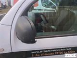 a white truck with a black stripe on the side of it