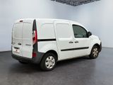 a white van that is parked in a room