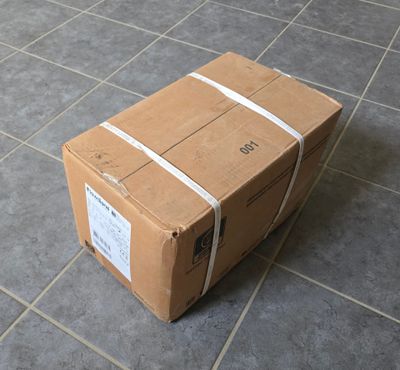 a cardboard box sitting on the floor on the floor