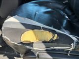 a piece of fabric on the seat of a car