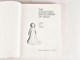 an open book with a drawing of a woman in a white dress