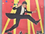 a poster of a man in a tuxedo jumping in the air