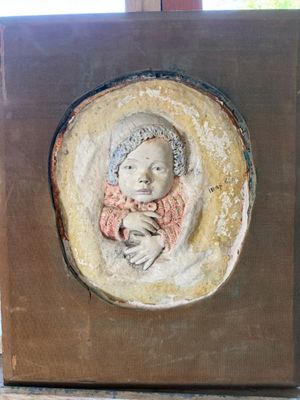a small picture of a baby in the middle of a picture