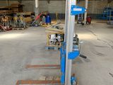 an image of a fork lifter in a warehouse