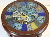 an image of a small table with a bird on top of it