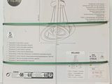 the box is open to show the contents of the light fixture